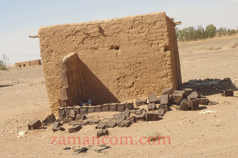 جدران من عبوات معدنية مملوءة بالطين